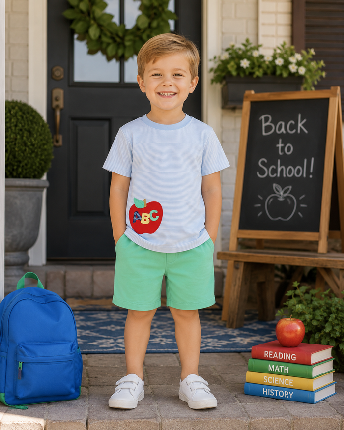 Dress your little one in Zuccini Kid’s ABC Light Blue Harry’s Play Tee, where playful apple appliqués meet soft, breathable fabric. Perfectly paired with Covington Green Knit Leo Shorts, this vibrant outfit inspires confidence and joy—ideal for the first day or any day of school!