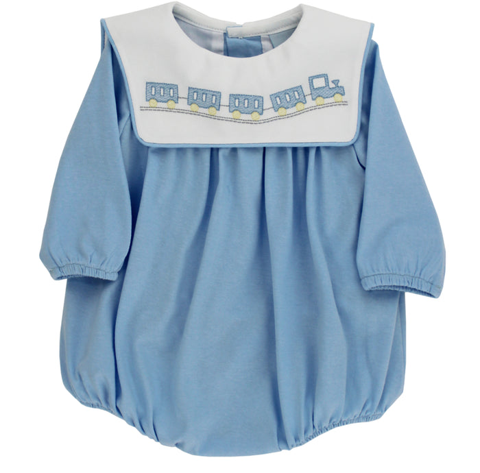 Dress your little one in Bailey Boys’ All Aboard Knit Infant Bubble and watch imaginations take flight! Soft, light blue knit wraps your baby in cozy comfort, while charming train embroidery sparks adventure from the very first wear. Ready for cuddles and journeys alike!