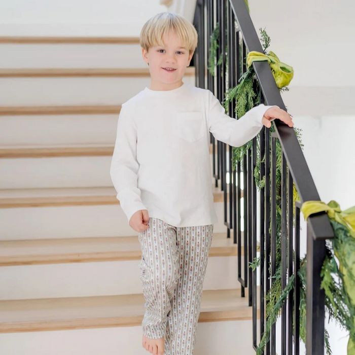 The Beckett Boys' Hangout Pant in Nutcracker Stripe by Lila &amp; Hayes offers comfort with a convenient drawstring waistband. Crafted from 100% Peruvian cotton, these pants are soft and durable. These pants make the perfect holiday loungewear!