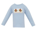 The Blue Knit Turkey Smocked Tee by Anavini brings festive charm to your little one’s Thanksgiving with soft, breathable fabric and delicate turkey smocking. This light blue tee blends comfort and tradition, making every moment cozy and memorable. Celebrate with warmth and style!