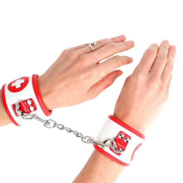 Cătușe sexy asistentă KINK Mini Nurse Wrist Restraints, pentru jocuri erotice, mărime ajustabilă, culoare alb cu roșu