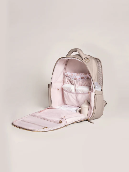 The Classic Backpack from JuJuBe has a sleek, innovative design that makes it easier than ever to stay organized on the go. This spacious, intuitively designed bag holds all your baby essentials—diapers, snacks, drinks, extra clothes, and more—plus personal items like your wallet, keys, and phone. Keep everything you need at your fingertips with an easy-access wipe pocket, insulated bottle pocket, and quick-reach cell phone pocket. The main compartment opens completely flat like a suitcase for easy packing,