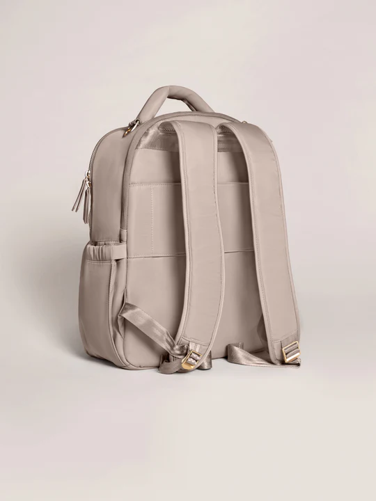 The Classic Backpack from JuJuBe has a sleek, innovative design that makes it easier than ever to stay organized on the go. This spacious, intuitively designed bag holds all your baby essentials—diapers, snacks, drinks, extra clothes, and more—plus personal items like your wallet, keys, and phone. Keep everything you need at your fingertips with an easy-access wipe pocket, insulated bottle pocket, and quick-reach cell phone pocket. The main compartment opens completely flat like a suitcase for easy packing,
