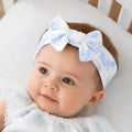 Sweet, soft, and perfectly polished, the Magnolia Baby Dreamy Hydrangeas Print Headband in sky blue is a charming accessory for your little one. Crafted from luxuriously soft 100% Pima cotton, this baby headband is gentle on delicate skin while offering a comfortable, secure fit.