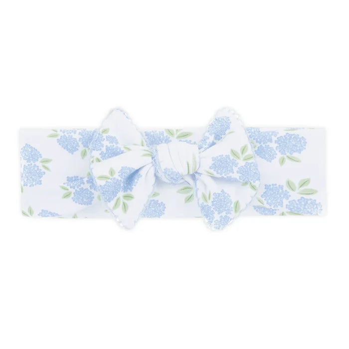 Sweet, soft, and perfectly polished, the Magnolia Baby Dreamy Hydrangeas Print Headband in sky blue is a charming accessory for your little one. Crafted from luxuriously soft 100% Pima cotton, this baby headband is gentle on delicate skin while offering a comfortable, secure fit.