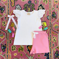 Elevate her wardrobe with Ellen's Eyelet White Knit Top by The Beaufort Bonnet Company. The darling eyelet flutter short sleeves add a touch of charm to this classic design, making it a versatile closet staple for spring and summer. A must-have for every little fashionista!