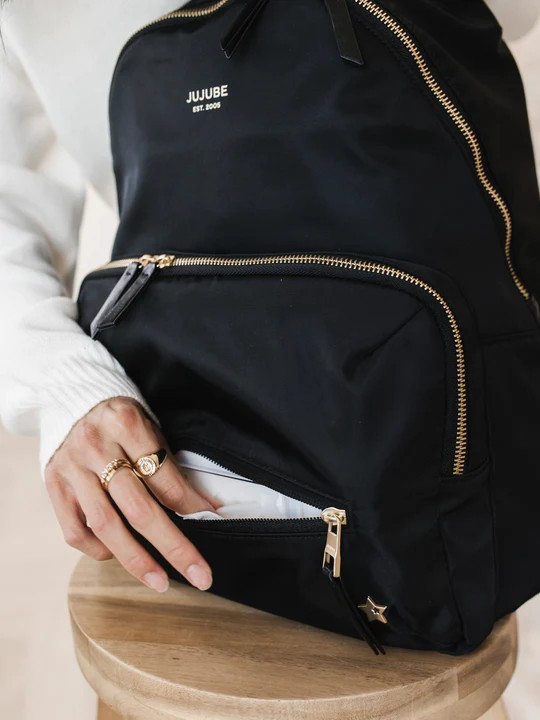 Everyone needs a trusty, everyday bag, and the Everyday Backpack from JuJuBe is here to be just that

Machine washable
11 pockets, including 2 insulated bottle pockets
Travel made easy with a trolley sleeve and removable stroller straps
Comfortable, adjustable shoulder straps
Removable stroller straps
Cushioned changing pad