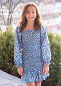 This Fall Floral Smocked Dress by Be Elizabeth combines charming floral patterns with a comfortable smocked design, making it a perfect choice for tweens. Its stylish fit enhances movement and confidence, while the vibrant print adds a touch of seasonal elegance. Ideal for everyday wear or special occasions, this dress is sure to become a favorite in her wardrobe.