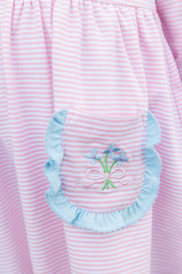 The Flower Bouquet Pant Set by Trotter Street Kids combines soft pink and white stripes with charming flower appliqués and light blue accents. Its cozy leggings and tunic with handy pockets create a delightful outfit that’s as playful as it is comfortable!