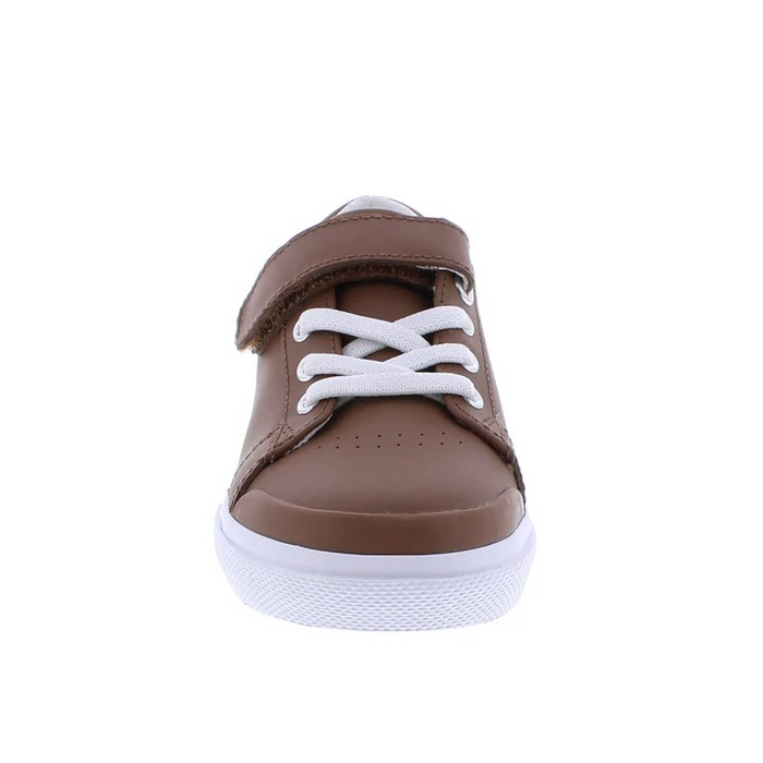 Footmates Reese Brown Leather Sneaker- Leather blucher oxford vulcanized sneaker featuring hook-and-loop closure and decorative elasticized false-laces.
Custom Fit System – Removable,&nbsp;dual&nbsp;insoles in Medium and Wide provided for customized fitting.
Roomy Toe Box – Allows tiny toes room to breathe and splay naturally during walking, enhancing balance and reducing rubbing, friction, and moisture.
Arch Support – Shoe last and insole designed to provide proper arch support for developing feet.
Firm He