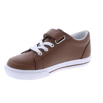 Footmates Reese Brown Leather Sneaker- Leather blucher oxford vulcanized sneaker featuring hook-and-loop closure and decorative elasticized false-laces.
Custom Fit System – Removable,&nbsp;dual&nbsp;insoles in Medium and Wide provided for customized fitting.
Roomy Toe Box – Allows tiny toes room to breathe and splay naturally during walking, enhancing balance and reducing rubbing, friction, and moisture.
Arch Support – Shoe last and insole designed to provide proper arch support for developing feet.
Firm He