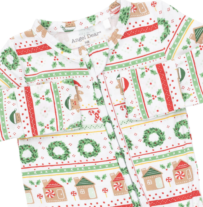 Angel Dear’s Gingerbread Fair Isle Green footie brings joyful holiday spirit in soft, cozy fabric. The two-way zipper ensures easy changes, while the convertible design grows with your baby, offering comfort and festive charm throughout the season. Perfect for memorable Christmas moments!