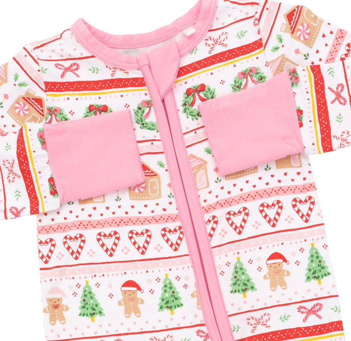 Angel Dear’s Gingerbread Fair Isle Pink combines cozy charm with practical design. This adorable footie and convertible romper features a festive gingerbread print, easy 2-way zipper access, and grows with your infant from newborn to 18 months—making holiday dressing effortless and joyful!