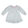 Hand-smocked bishop dress in a charming gingerbread print, crafted from a soft cotton blend. Long sleeves and timeless smocking detail create an heirloom-quality piece perfect for special occasions or everyday elegance. By Shop Teeta.