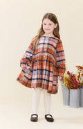 Celebrate autumn in vibrant style with the Girls Mae Dress - Hayride Plaid by Pink Chicken. Its warm orange plaid and button-down design bring cozy charm and effortless comfort, making it the perfect choice for spirited tweens ready to embrace the season with confidence!