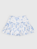 The Girls Nicole Athletic Skort from J Marie pairs effortless style with performance. Featuring a striking blue floral pattern that coordinates beautifully with the Nicole Slouch Tee, this skort is built for active play. The flexible fabric blend delivers durability through high-energy movement, while a wide waistband ensures a secure, comfortable fit that stays put. Built-in shorts provide extra coverage and peace of mind—perfect for running, jumping, and all-day adventures.