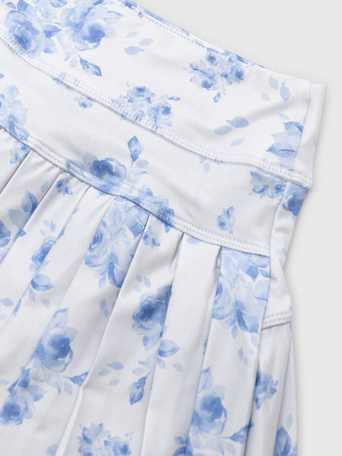 The Girls Nicole Athletic Skort from J Marie pairs effortless style with performance. Featuring a striking blue floral pattern that coordinates beautifully with the Nicole Slouch Tee, this skort is built for active play. The flexible fabric blend delivers durability through high-energy movement, while a wide waistband ensures a secure, comfortable fit that stays put. Built-in shorts provide extra coverage and peace of mind—perfect for running, jumping, and all-day adventures.