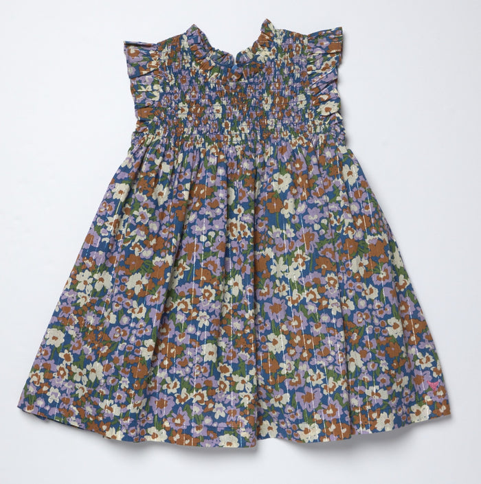 Pink Chicken’s Girls Stevie Dress in True Blue Sketched Floral bursts with vibrant colors and lively florals, making every moment feel joyful and bright. Perfect for tween girls who love playful, spirited style that stands out effortlessly.