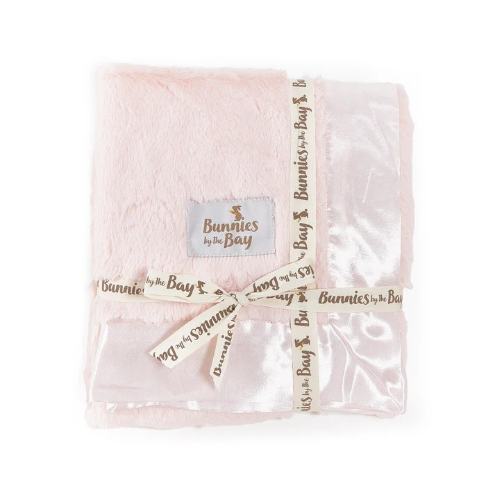 Softness and texture, everything your little snugglers are looking for! This sweet, cuddly blanket, with its nibble fur and satin binding, is perfect for cozy cuddles and comforting moments. Your little one will love snuggling up with this blanket, feeling the gentle touch of the softest fur and the silky satin. Whether it’s bedtime, movie night or just a quiet moment, this blanket is sure to bring comfort and joy. Let the snuggles begin!
