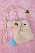 The Hippity Hop Purse is the perfect accessory for little ones who love bunnies! Shaped like an adorable bunny, this charming purse features a cute felt carrot dangling from the long strap, adding a playful touch. Perfect addition to any Easter basket or outfit!
