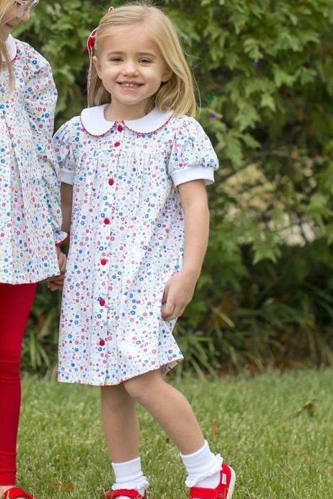 The Breccan Dress is a sweet and timeless style for the school year and beyond. Made in our adorable Homeroom Blooms knit fabric, this comfortable dress features a classic button-front design for an extra touch of traditional cuteness.

Perfect for the first day of school, special moments, and everyday adventures.