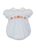 Infant Girls Gingham Pumpkin Bubble is a darling seasonal silhouette crafted from a soft gingham knit fabric in a gentle pastel blue. The short puff sleeves and crisp white Peter Pan collar-finished with delicate pink scalloped stitching-frame the classic shape beautifully. Across the chest, a finely smocked panel features embroidered pumpkins in soft orange and blush tones.

Designed for comfort and picture‑perfect wear, the bubble includes softly elasticized leg openings and a gathered silhouette that all