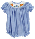Celebrate autumn’s charm in the Infant Girls Pumpkin Patch Bishop Bubble by Bailey Boys. The delicate blue mini check and exquisite pumpkin smocking capture the season’s warmth, making every pumpkin patch adventure irresistibly sweet and memorable.