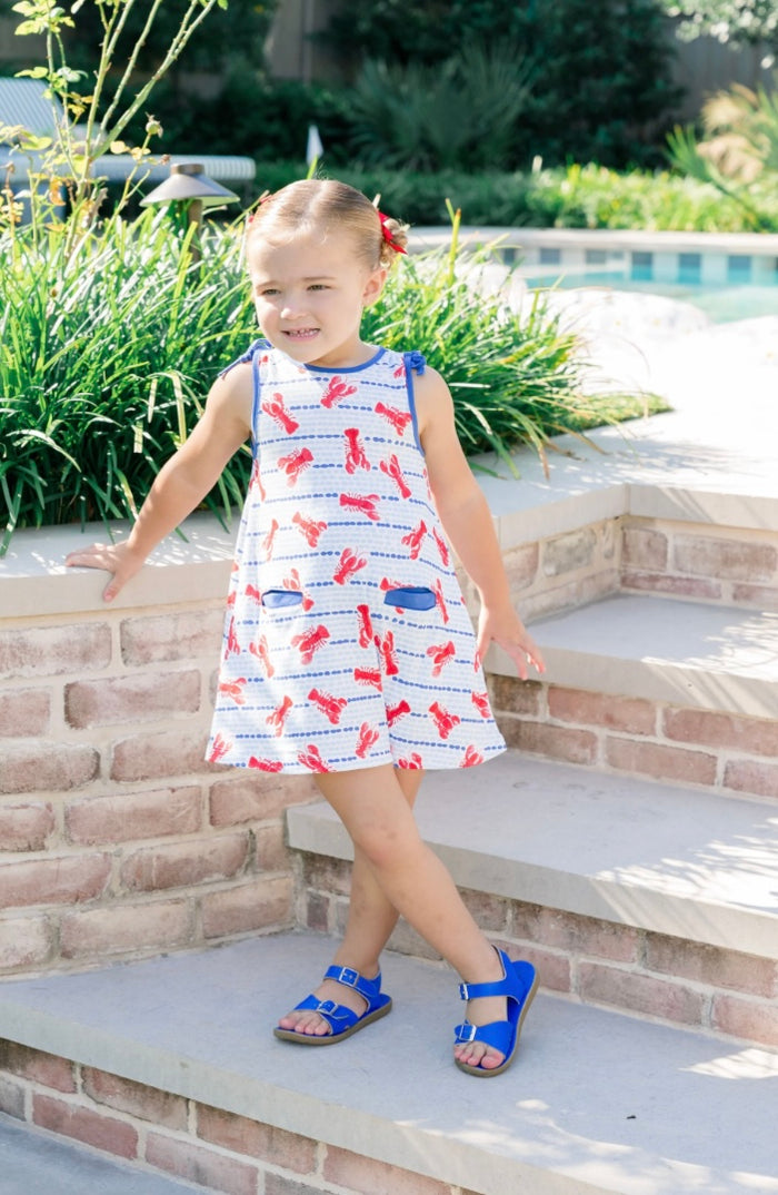 Embrace summer with the Lobster Sleeveless Dress by The Proper Peony! Crafted from soft, breathable Pima cotton, this charming dress features an adorable lobster print that will make your little one shine. Perfect for warm days, it combines playful style with ultimate comfort, ensuring endless fun in the sun!