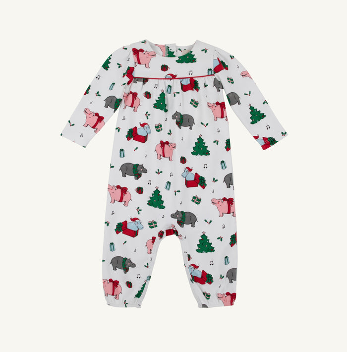 TBBC’s Penny’s Playsuit in I Want A Hippopotamus wraps your little one in vintage charm and cozy warmth. Its heavyweight fabric keeps chill at bay, while the playful holiday print sparks joy on every whimsical Christmas day. Celebrate festive moments with comfort and timeless style!