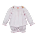 Celebrate Thanksgiving in style with the Pink Knit Stripe Turkey Bishop Set by Petit Bebe. Soft pink stripes and delicate turkey smocking create an adorable, cozy ensemble, perfectly paired with matching knit bloomers for your toddler girl’s comfort and charm on this special day!