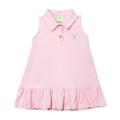 This Pink Knit Tennis Dress from Zuccini Kids is perfect for your active toddler girl. The soft knit fabric ensures comfort during sports activities, while the drop waist ruffle skirt adds a cute touch. The dress also features a tennis embroidered applique, making it a stylish and functional choice for your little one.
