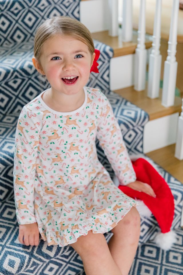 The Proper Peony’s Prancer Pima Play Dress wraps your toddler in soft, breathable Pima cotton, while the charming reindeer print sparks holiday joy. Perfectly effortless for playtime or festive gatherings, this dress brings comfort and cheer to every moment.