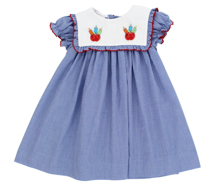Celebrate your little girl's first day of school in the Pretty Pencils Float Dress by Bailey Boys! Its charming blue gingham pattern and playful pencil and apple appliqués create a joyful, fresh look that sparks confidence and excitement for new beginnings. Ready to brighten every classroom moment!