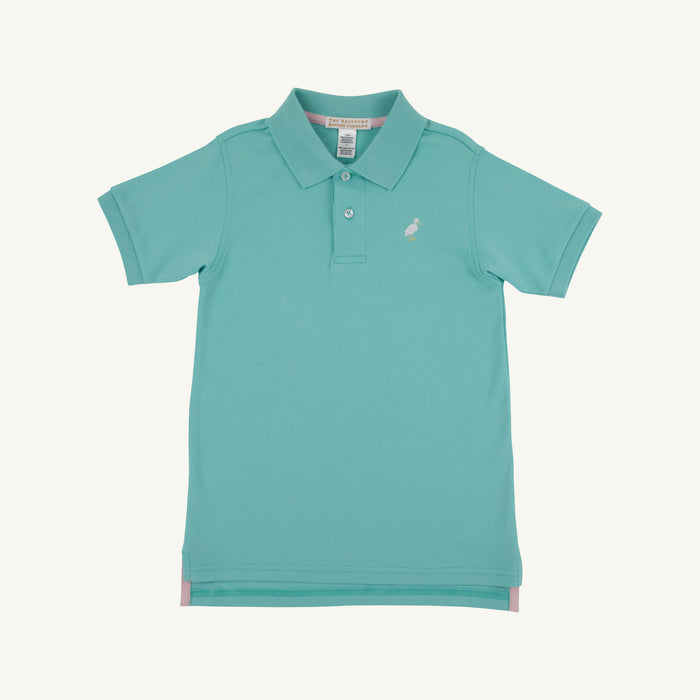 Dress your little one in the delightful Prim and Proper Polo in Turks Teal by The Beaufort Bonnet Company! Made from soft Pima cotton, this vibrant polo adds a touch of elegance to any spring or summer outing. Make every moment special with a shirt that’s both comfortable and stylish!