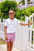 Elevate your child's wardrobe with the Prim and Proper Polo in Worth Ave White from The Beaufort Bonnet Company. Crafted from soft Pima cotton, this classic white polo features the iconic TBBC stork, making it both stylish and comfortable. A timeless staple perfect for spring and summer!