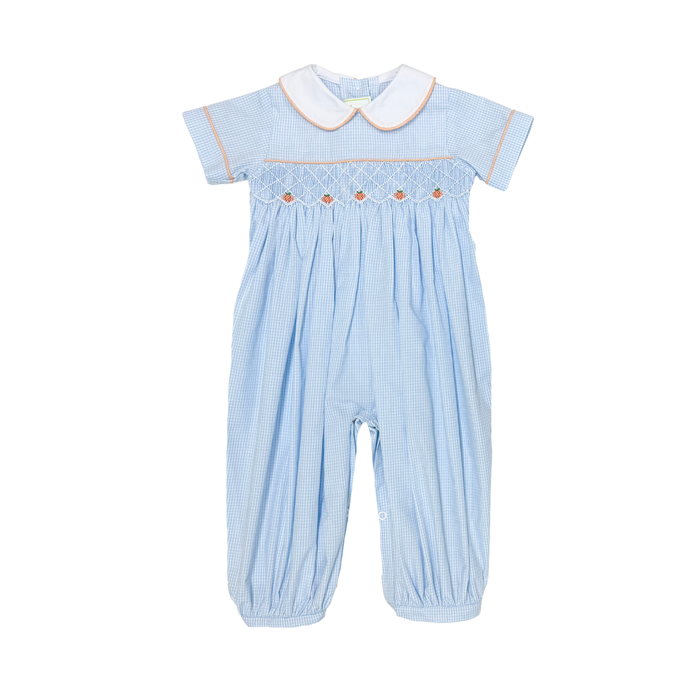 Celebrate charm and comfort with the Pumpkin Benjamin Bubble by Zuccini Kids. Its delicate light blue gingham, accented by vibrant pumpkin smocking and crisp white Peter Pan collar with orange piping, brings a joyful, classic touch to your little boy’s wardrobe. Perfect for making every autumn moment memorable!