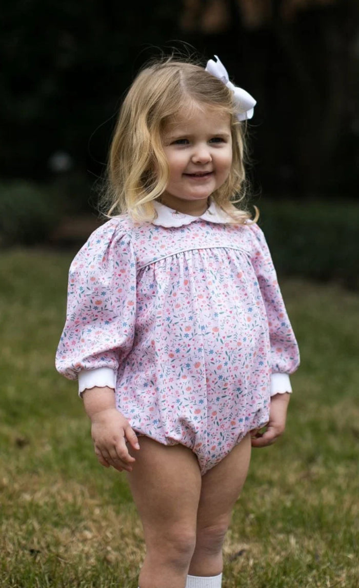 The Pumpkin Grove Floral Bubble by Lullaby Set is designed to celebrate your most cherished autumn moments! Created from cozy knit fabric with delicate pumpkin embroidery on the collar, this outfit is ideal for fall photos, Thanksgiving celebrations, and creating unforgettable memories with family!