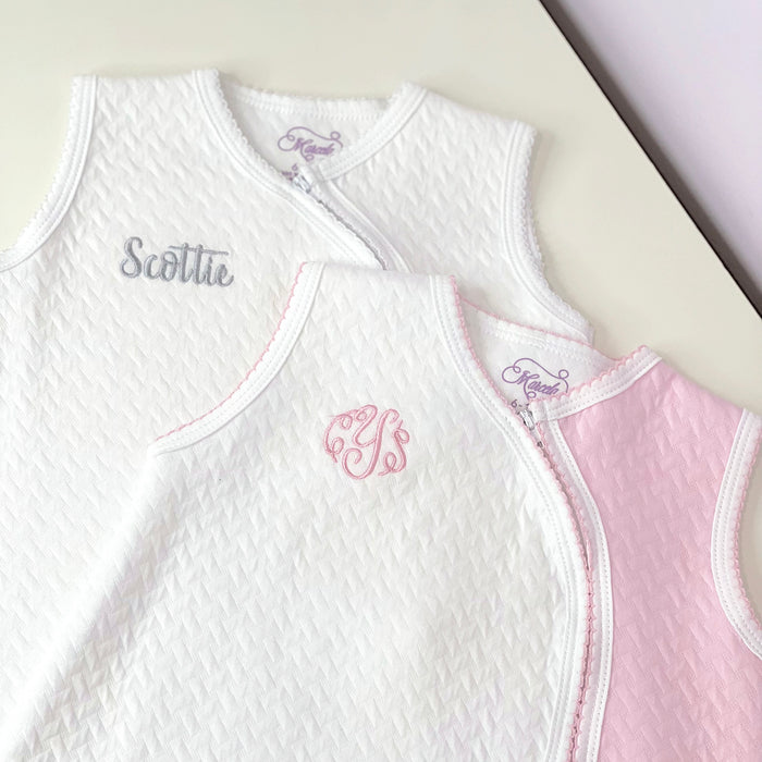 Introducing the Marcela Quilted Pima Cotton Zipped Sleep Sack! Made from the softest Pima cotton, this sleep sack offers ultimate comfort for your little one. Its fully white design allows for personalization, making it the perfect gift for any new arrival. Say hello to cozy, worry-free nights with our sleep sack.