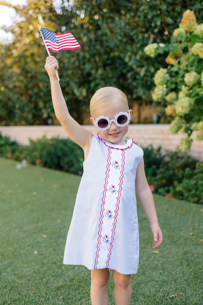 The 4th of July never looked so proper! Our Revere Fireworks Dress from The Proper Peony for toddler girls is ready for every patriotic day and all the days between, too. Red, white and blue is perfect all summer long. Designed with timeless elegance and playful spirit, this dress captures the essence of classic American style in a silhouette that's both comfortable and refined.