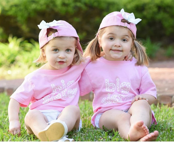 Celebrate your little one's promotion to big sister with Mustard &amp; Ketchup Kids' Short-Sleeve "Big Sister" T-Shirt. This girls' play t-shirt is perfect for showing off her new title and features short sleeves for added comfort. Empower your child and make her feel special with this playful and stylish shirt.