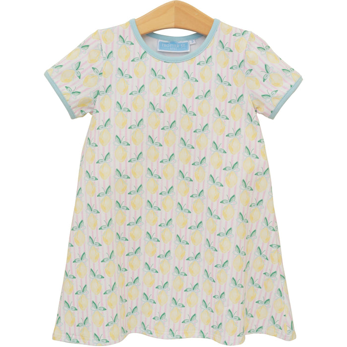 Embrace sunshine and joy with the Squeeze the Day Dress by Trotter Street Kids! Featuring a delightful lemon pattern, this comfortable, breathable knit dress is perfect for carefree days in spring and summer. Let your little one radiate happiness and confidence wherever she goes!