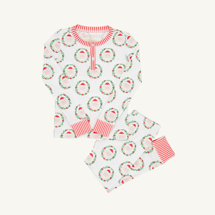 Sutton’s Sweet Dream Set by The Beaufort Bonnet Company wraps your toddler in cozy, festive charm with darling Santa prints and vibrant stripes. Perfect for magical Christmas mornings and joyful family moments, these classic pajamas bring warmth and holiday spirit to every celebration!