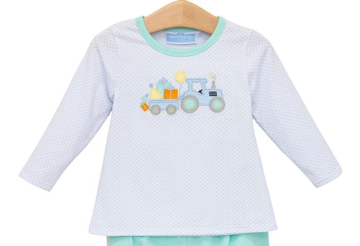 Celebrate your little farmer’s special day with the Tractor Birthday Shirt by Trotter Street Kids. This cozy, mini dotted long-sleeve tee features an adorable tractor appliqué that brings birthday joy to life. Perfect for any toddler boy who dreams of tractors and adventure!