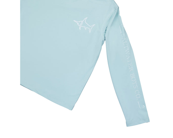 Protect your boys in style with the Tybee Rashguard in Light Blue! Designed for toddler to tween boys, this easy-to-wear rashguard offers excellent sun protection while keeping them comfortable. With its vibrant color, your child will shine brightly during all their adventures in the sun!