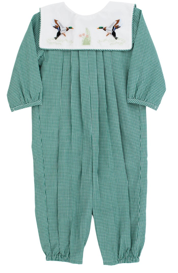 Bailey Boys’ Waterfowl Long Romper blends timeless charm with playful detail. The green mini check fabric feels soft and cozy, while the crisp white collar showcases delicate mallard and waterfowl embroidery, making every moment with your little one uniquely special.