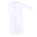 Indulge in the luxurious softness of this pima cotton baby girl converter gown with delicate pastel pink picot trim. Effortlessly transition from playtime to nap-time with convenient snap closures. Perfect for middle-of-the-night diaper changes, this piece adds an exclusive touch to your little one's layette.

-Coordinates with other items in the Solid Essentials Collection
-Embroidery or Monogram ready!
-100% Peruvian Pima Cotton
-Made in Peru
-Machine Washable