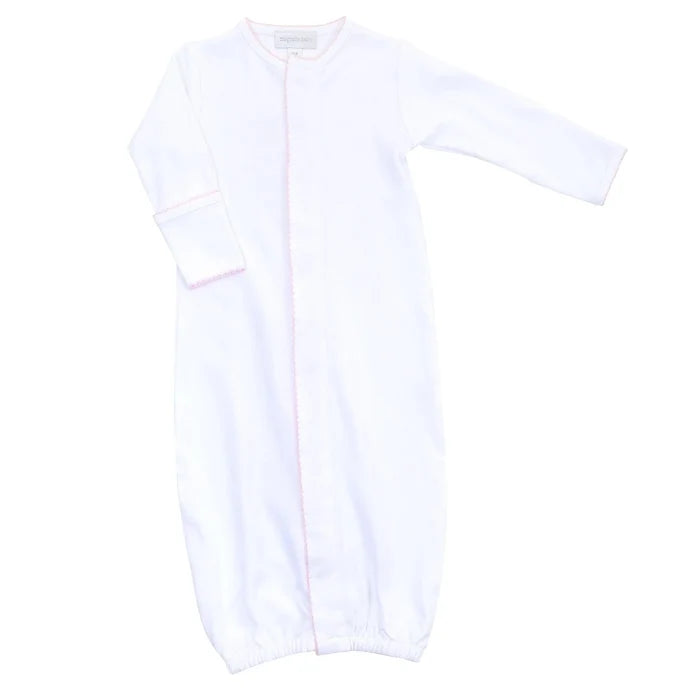 Indulge in the luxurious softness of this pima cotton baby girl converter gown with delicate pastel pink picot trim. Effortlessly transition from playtime to nap-time with convenient snap closures. Perfect for middle-of-the-night diaper changes, this piece adds an exclusive touch to your little one's layette.

-Coordinates with other items in the Solid Essentials Collection
-Embroidery or Monogram ready!
-100% Peruvian Pima Cotton
-Made in Peru
-Machine Washable