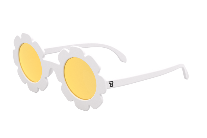 Say hello to the sweetest shades of the season! Featuring crisp white frames and warm yellow mirrored lenses, these standout sunnies are turn every sunny day into a blooming adventure and are perfect for little trendsetters who love to shine. From playground playdates to family vacations, they add a touch of fun and a little extra magic to every sunny moment. Each pair of sunglasses comes with a microfiber storage bag that doubles as a cleaning cloth to keep your little one’s shades safe and clean.