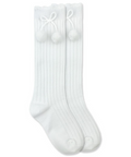 Add a touch of fun to any classic outfit with our White Knee-High Pom Pom Socks for girls from Jeffries Socks. Made with high-quality materials, these socks are comfortable and durable. Perfect for any occasion, these socks will keep your little one's feet cozy and stylish.