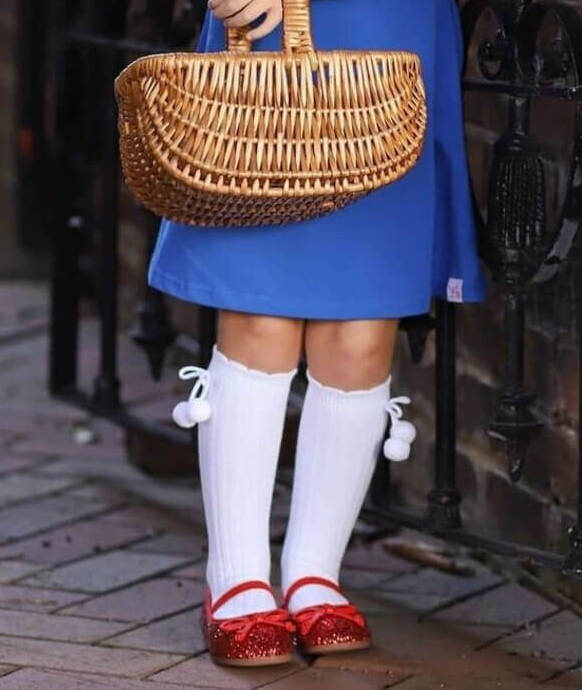 Add a touch of fun to any classic outfit with our White Knee-High Pom Pom Socks for girls from Jeffries Socks. Made with high-quality materials, these socks are comfortable and durable. Perfect for any occasion, these socks will keep your little one's feet cozy and stylish.